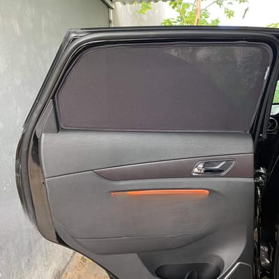 Custom-fit sun shades fitted to a BAIC X55