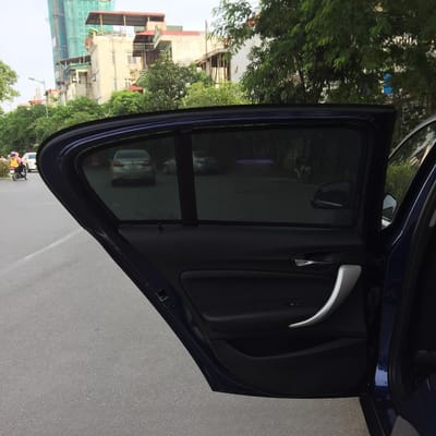 Custom-fit sun shades fitted to a BMW 118i