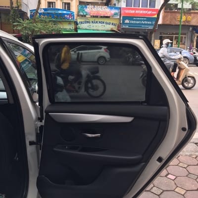 Custom-fit sun shades fitted to a BMW 218i 5 seats