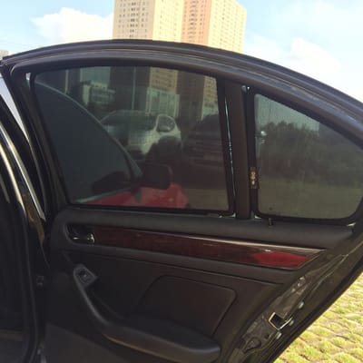 Custom-fit sun shades fitted to a BMW 325i E46