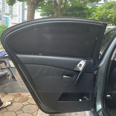 Custom-fit sun shades fitted to a BMW 520i 2006-2009