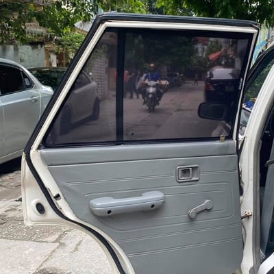 Custom-fit sun shades fitted to a KIA CD5 PRIDE HATCHBACK