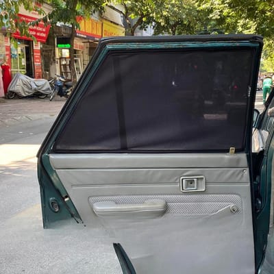 Custom-fit sun shades fitted to a KIA CD5 PRIDE SEDAN