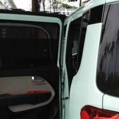 Custom-fit sun shades fitted to a KIA RAY