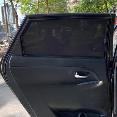 Custom-fit sun shades fitted to a KIA RONDO
