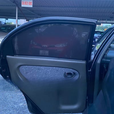 Custom-fit sun shades fitted to a KIA SPECTRA