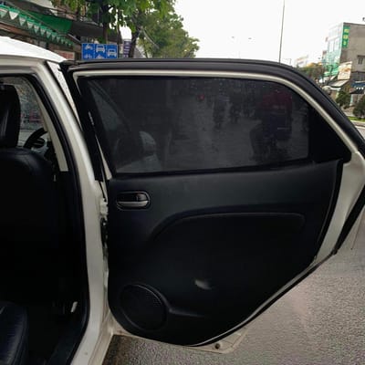 Custom-fit sun shades fitted to a MAZDA 2 SEDAN 2010-2015