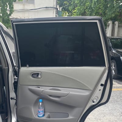 Custom-fit sun shades fitted to a MAZDA PREMACY