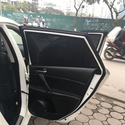Custom-fit sun shades fitted to a MAZDA 3 HATCHBACK 2009-2014