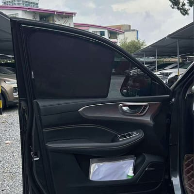 Custom-fit sun shades fitted to a MG RX5