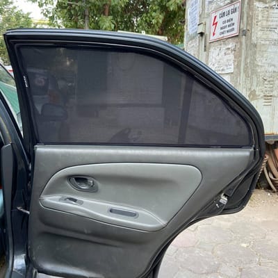 Custom-fit sun shades fitted to a MITSUBISHI LANCER