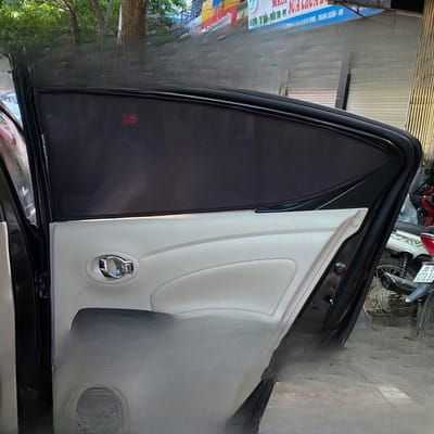 Custom-fit sun shades fitted to a NISSAN SUNNY