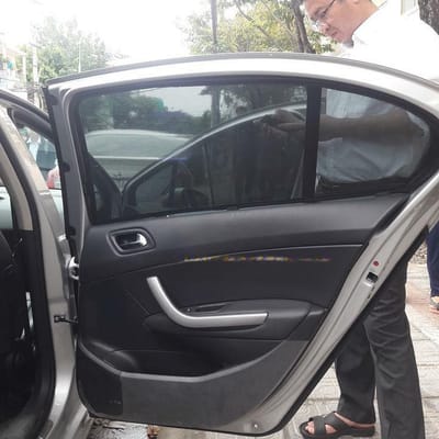 Custom-fit sun shades fitted to a PEUGEOT 408