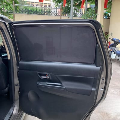 Custom-fit sun shades fitted to a SUZUKI XL7