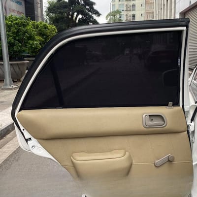 Custom-fit sun shades fitted to a TOYOTA COROLLA 1997-2000