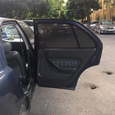 Custom-fit sun shades fitted to a TOYOTA CAMRY 1993-1997