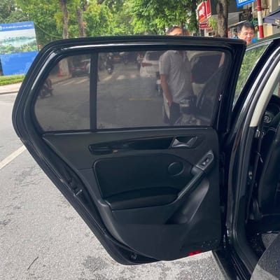 Custom-fit sun shades fitted to a VOLKSWAGEN GOLF