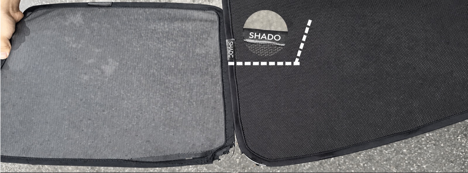 Two shade panels side by side. The one on the left has faded to a patchy grey; ours on the right is still deep black, with a bound edge and a branded tab.