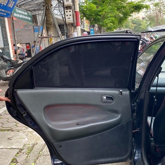 MAZDA 323 1997 custom-fit car window sun shades — photo 2